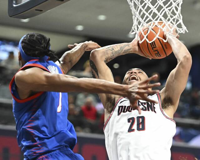 Joe Reece (right) is one of five Duquesne players who joined the team through the transfer portal.