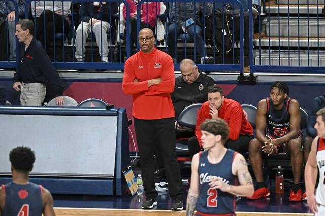 Cleary coach Carl Thomas, a former Duquesne assistant, looks on as his first-year team battles the Dukes on Saturday, Dec. 30, 2023, at UPMC Cooper Fieldhouse.