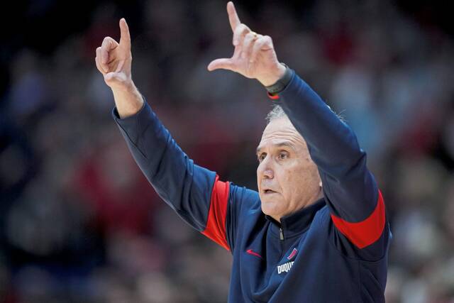 Duquesne coach Keith Dambrot works the sideline during a game against Dayton on Feb. 13. The teams meet again in the A-10 Tournament quarterfinals.