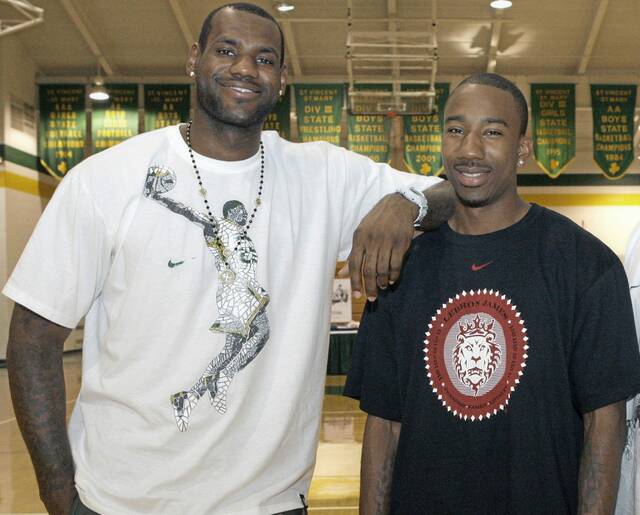 Former Akron St. Vincent-St. Mary High School basketball teammates LeBron James and Dru Joyce III in 2009