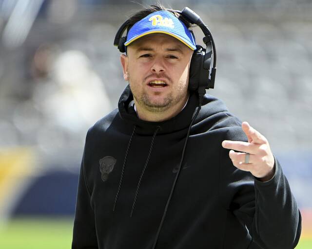 Pitt offensive coordinator Kade Bell coaches during the Blue-Gold game on Saturday, April 13, 2024, at Acrisure Stadium.