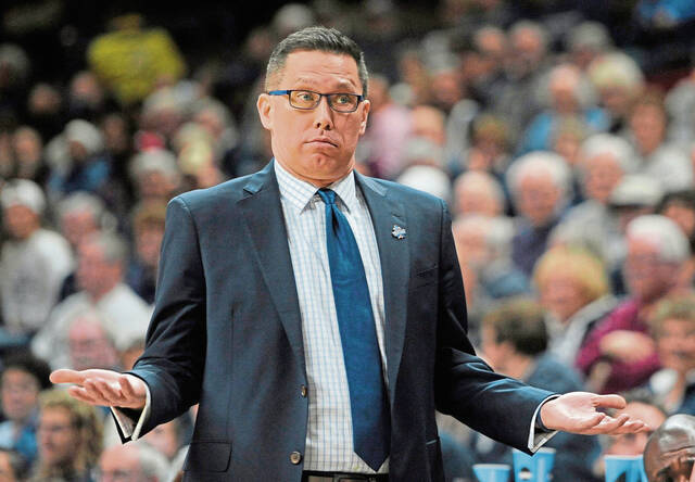 Duquesne head coach Dan Burt gestures during the first half of a second round of a women’s college basketball game against Connecticut in the NCAA Tournament, Monday, March 21, 2016, in Storrs, Conn.