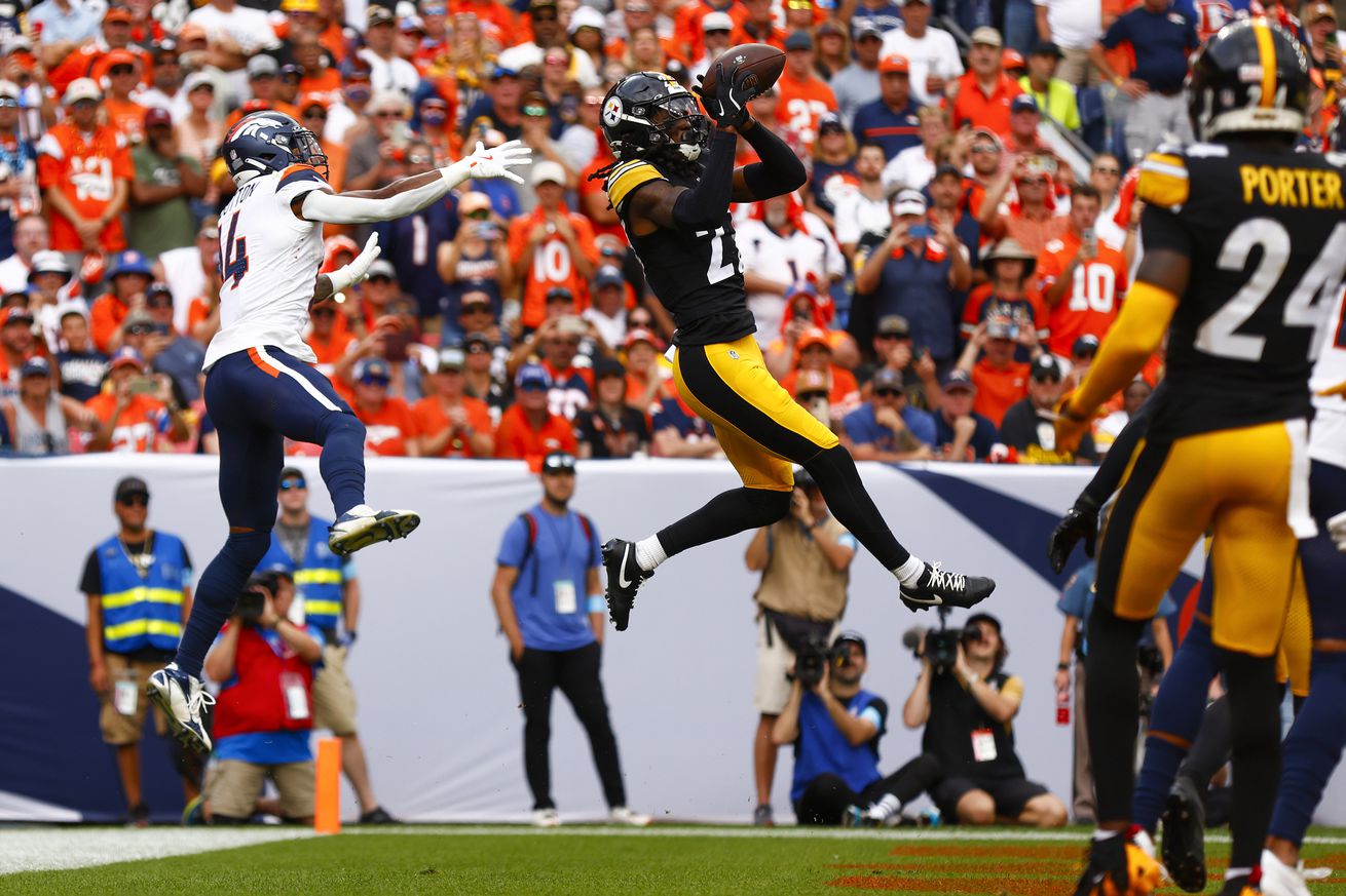 Cory Trice Jr. #27 of the Pittsburgh Steelers intercepts a pass intended for Courtland Sutton #14 of the Denver Broncos during the third quarter at Empower Field At Mile High on September 15, 2024 in Denver, Colorado.