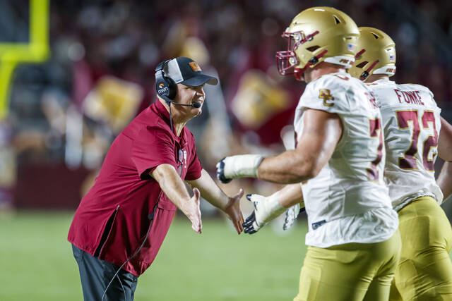 Boston College coach Bill O’Brien congratulates players after a touchdown against Florida State on Monday.