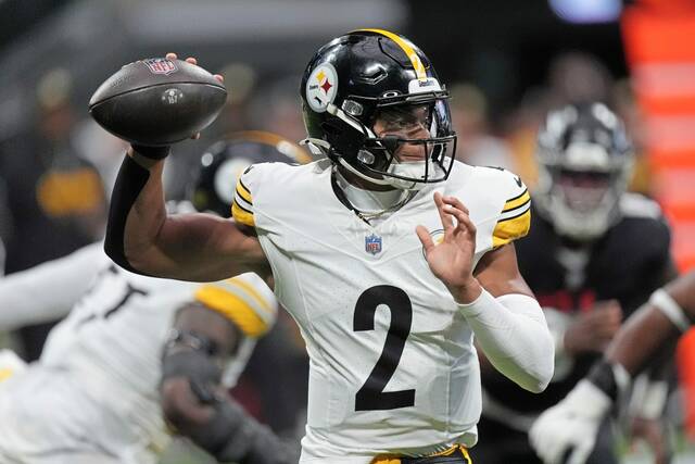 Steelers quarterback Justin Fields looks to pass against the Atlanta Falcons on Sept. 8, 2024, in Atlanta.