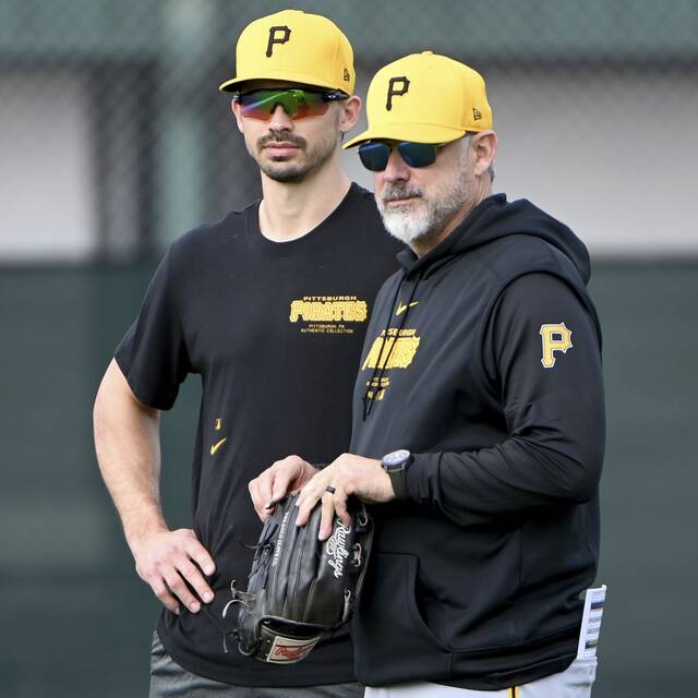 Pirates left fielder Bryan Reynolds watches a workout with manager Derek Shelton on Thursday, Feb. 15, 2024, at Pirate City in Bradenton.