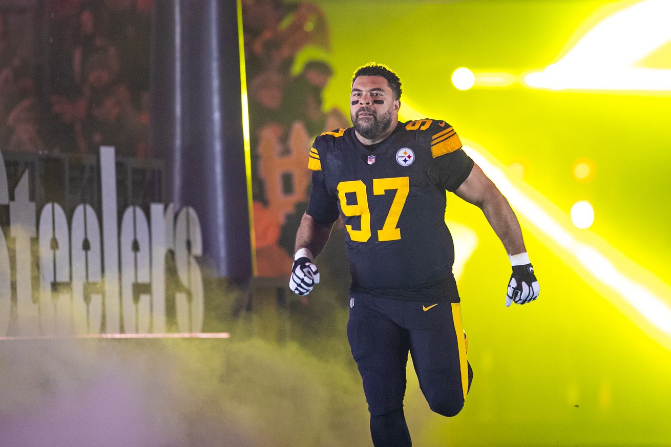 Pittsburgh Steelers defensive tackle Cameron Heyward (97) runs onto the field during the regular season NFL football game between the New England Patriots and Pittsburgh Steelers on December 07, 2023 at Acrisure Stadium in Pittsburgh, PA.  