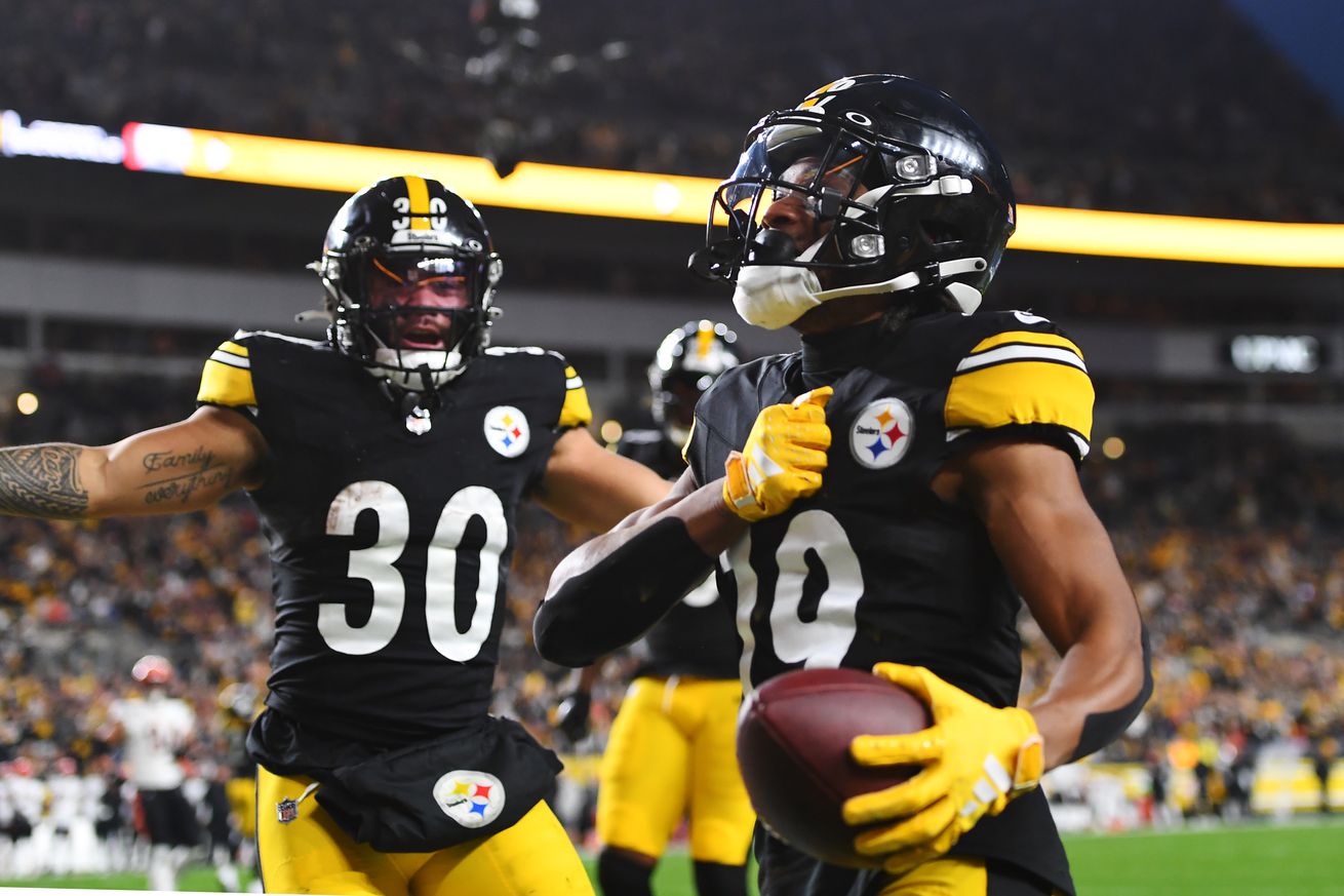 Calvin Austin III #19 of the Pittsburgh Steelers celebrates after scoring a touchdown during the second quarter of a game against the Cincinnati Bengals at Acrisure Stadium on December 23, 2023 in Pittsburgh, Pennsylvania.