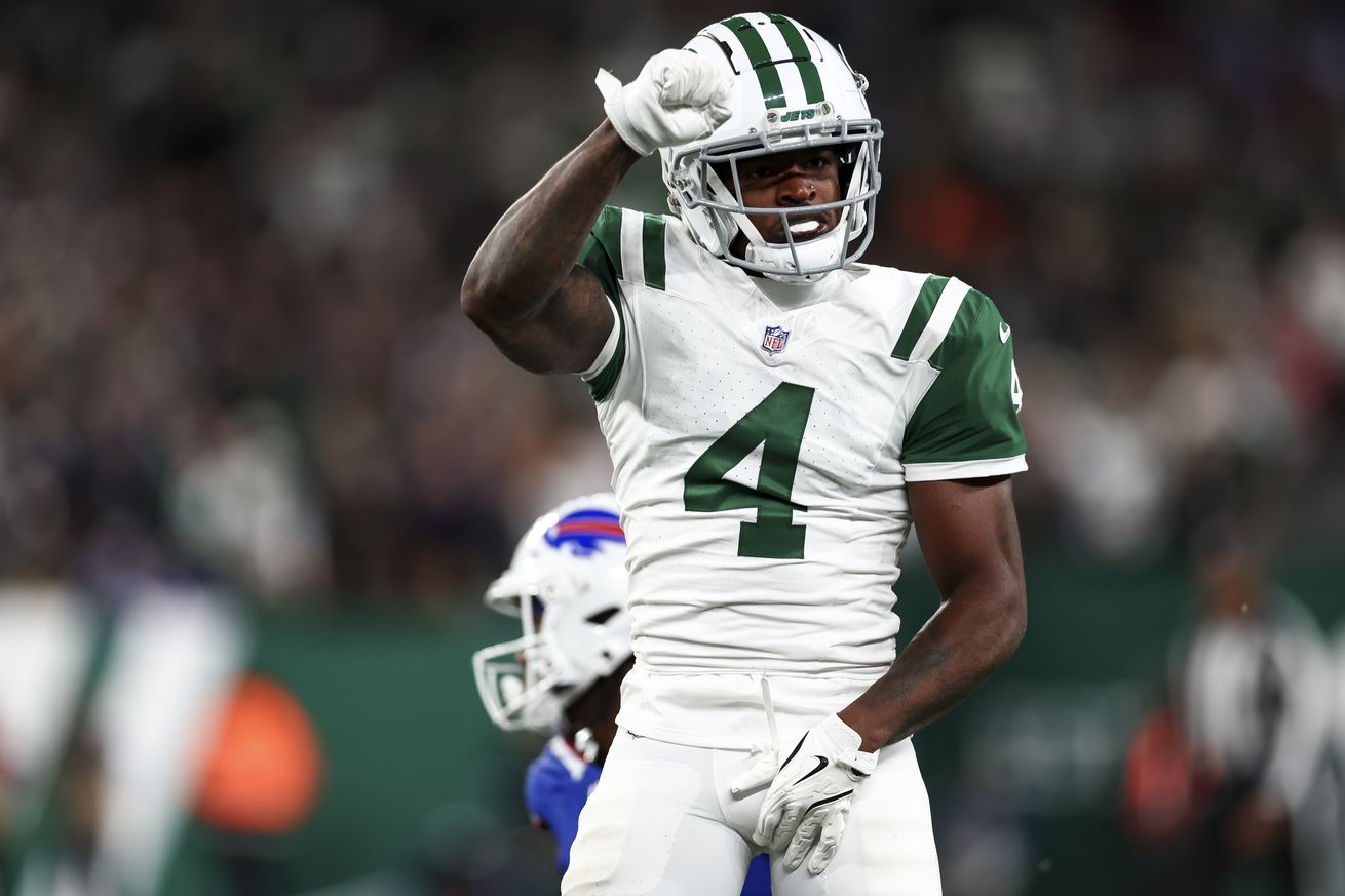 D.J. Reed #4 of the New York Jets celebrates after a play during the first half of an NFL game against the Buffalo Bills at MetLife Stadium on October 14, 2024 in East Rutherford, New Jersey.