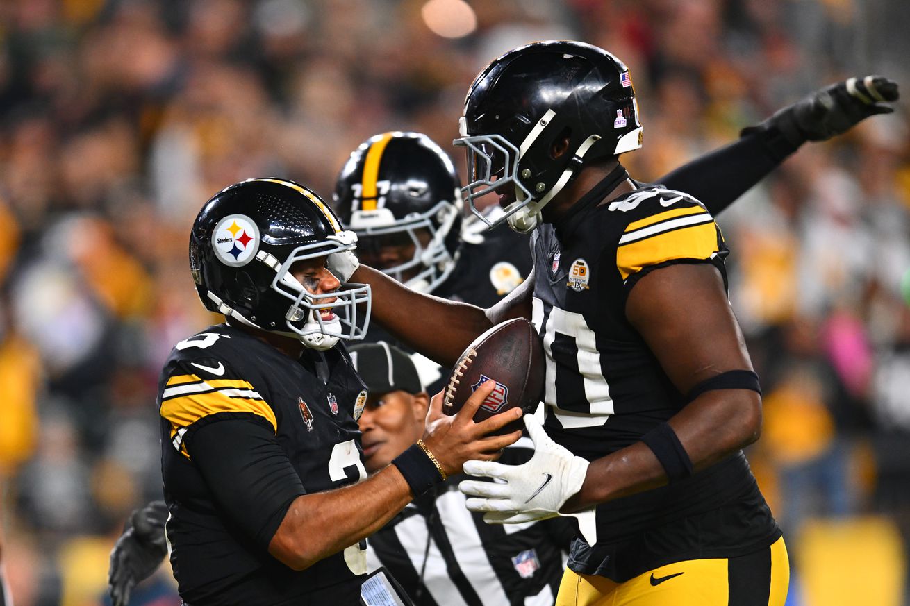 Russell Wilson #3 of the Pittsburgh Steelers celebrates a touchdown with Darnell Washington #80 during the third quarter against the New York Jets at Acrisure Stadium on October 20, 2024 in Pittsburgh, Pennsylvania.