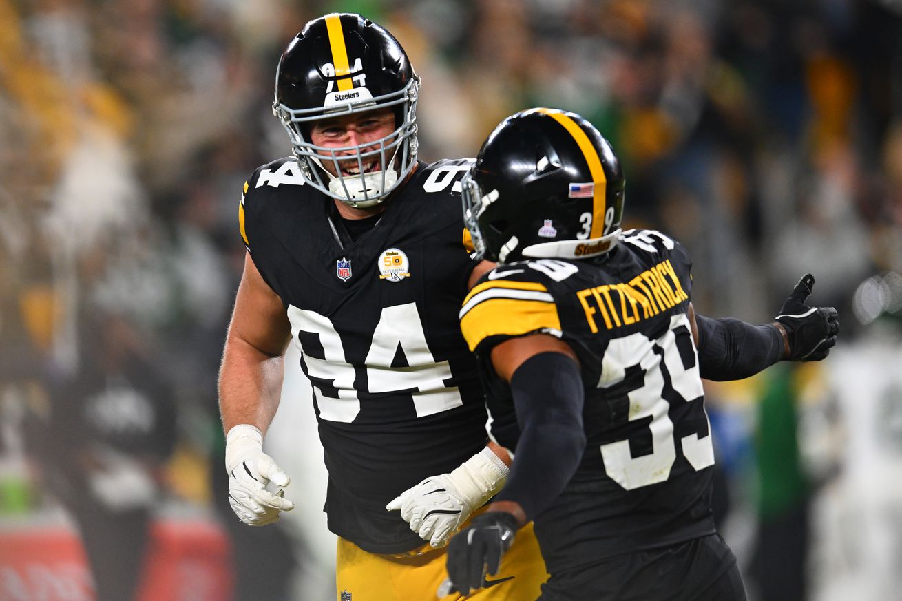 Dean Lowry #94 of the Pittsburgh Steelers celebrates after blocking a field goal with Minkah Fitzpatrick #39 during the third quarter against the New York Jets at Acrisure Stadium on October 20, 2024 in Pittsburgh, Pennsylvania.