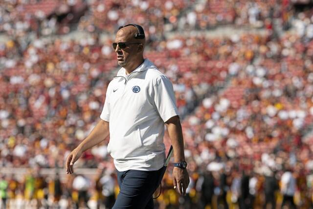 Penn State head coach James Franklin walks on the field during an NCAA football game against Southern California on Saturday, Oct. 12, 2024, in Los Angeles.