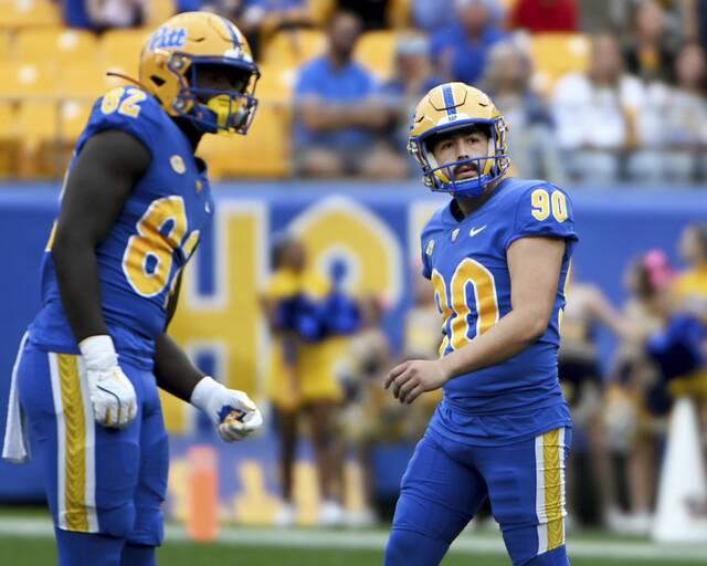 Pitt’s kicker Ben Sauls watches his 58-yard field goal with Malachi Thomas during the second quarter against California on Saturday, Oct. 12, 2024, at Acrisure Stadium.