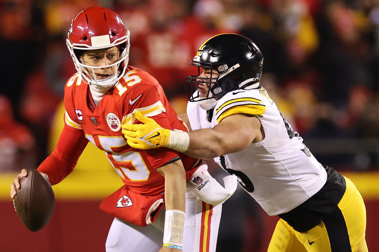 Patrick Mahomes #15 of the Kansas City Chiefs is sacked by Alex Highsmith #56 of the Pittsburgh Steelers in the second quarter in the NFC Wild Card Playoff game at Arrowhead Stadium on January 16, 2022 in Kansas City, Missouri.