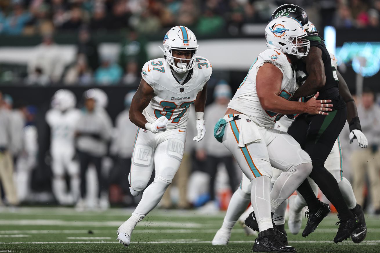 Darrynton Evans #37 of the Miami Dolphins runs a route during an NFL football game against the New York Jets at MetLife Stadium on November 24, 2023 in East Rutherford, New Jersey.