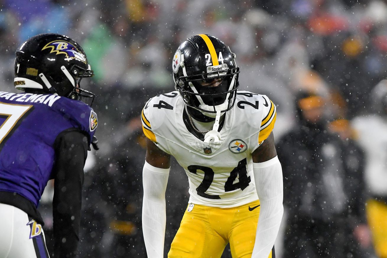 Steelers cornerback Joey Porter, Jr. (24) covers a receiver during the Pittsburgh Steelers versus Baltimore Ravens NFL game at M&T Bank Stadium on January 6, 2024 in Baltimore, MD.