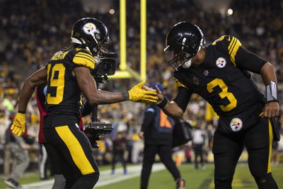 Pittsburgh Steelers wide receiver Calvin Austin III celebrates with quarterback Russell Wilson after they collaborate for a touchdown against the New York Giants from Acrisure Stadium.