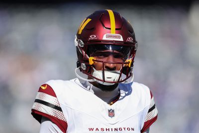 Jayden Daniels #5 of the Washington Commanders warms up prior to the game against the New York Giants at MetLife Stadium on November 03, 2024 in East Rutherford, New Jersey.