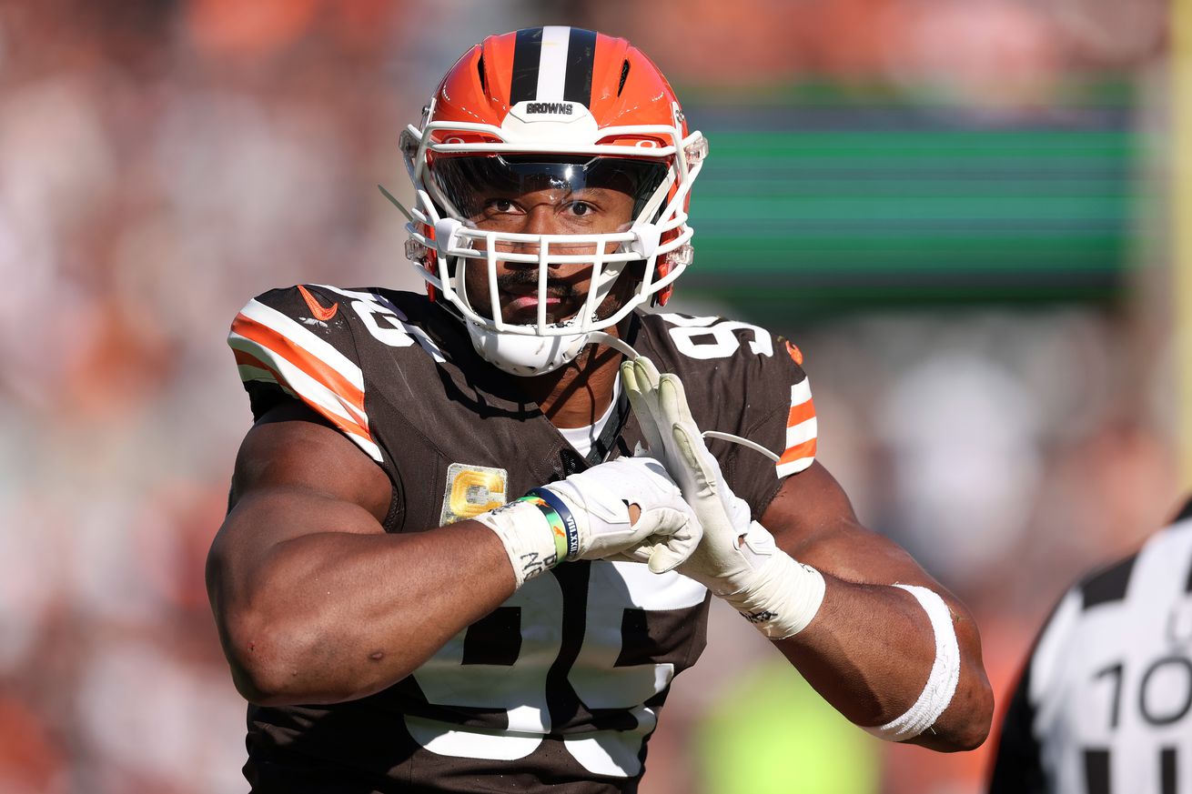 Myles Garrett #95 of the Cleveland Browns celebrates after a sack in the first quarter of a game against the Los Angeles Chargers at Huntington Bank Field on November 03, 2024 in Cleveland, Ohio.