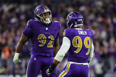 Nnamdi Madubuike #92 of the Baltimore Ravens celebrates with Odafe Oweh #99 after a play against the Cincinnati Bengals during the first half at M&T Bank Stadium on November 7, 2024 in Baltimore, Maryland.