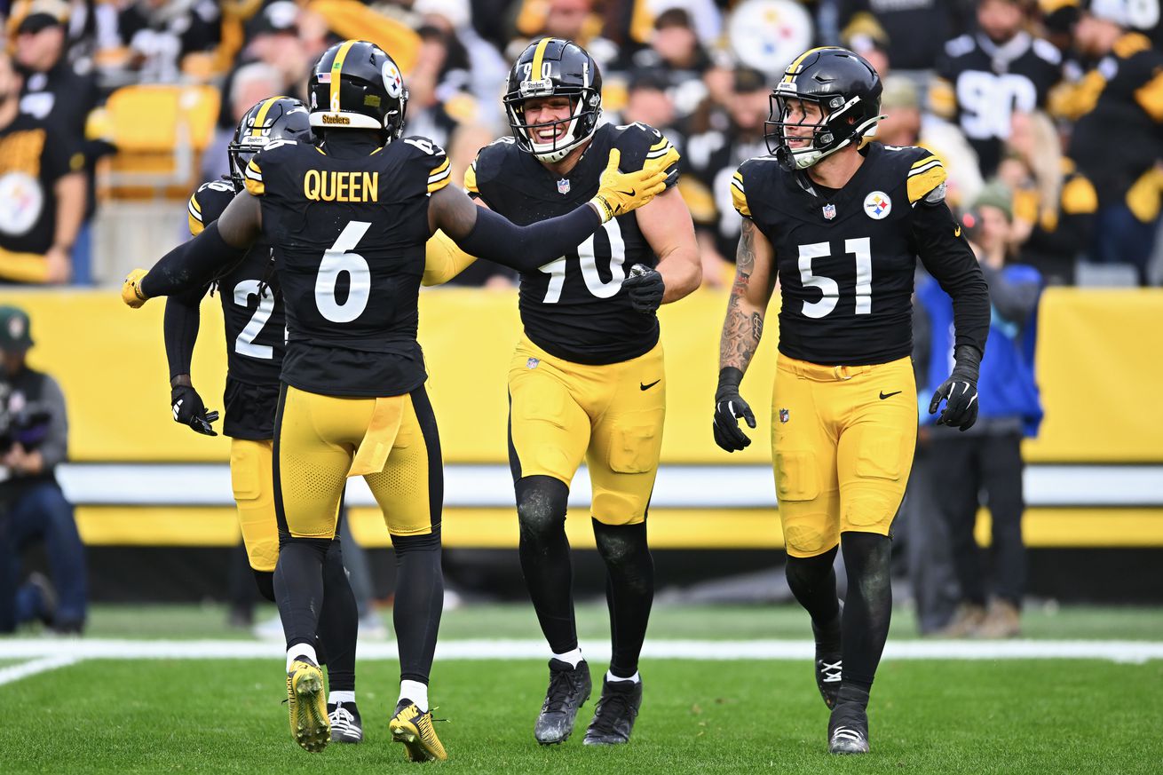 T.J. Watt #90 of the Pittsburgh Steelers celebrates with teammates after a third down stop in the fourth quarter of a game against the Baltimore Ravens at Acrisure Stadium on November 17, 2024 in Pittsburgh, Pennsylvania.