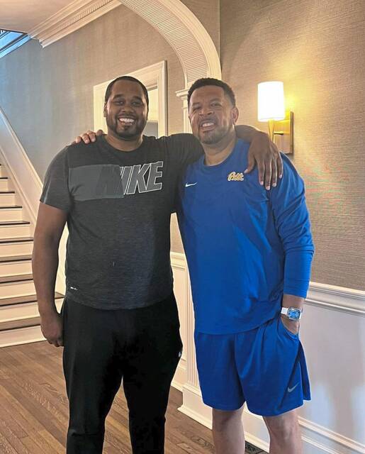 Pitt basketball coach Jeff Capel with his former walk-on player at VCU, Jesse Pellot-Rosa
                                Pitt basketball coach Jeff Capel with his former walk-on player at VCU, Jesse Pellot-Rosa