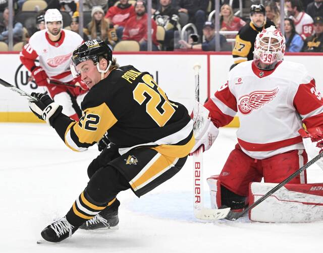 The Penguins’ Sam Poulin plays against the Red Wings in the third period Wednesday	at PPG Paints Arena.