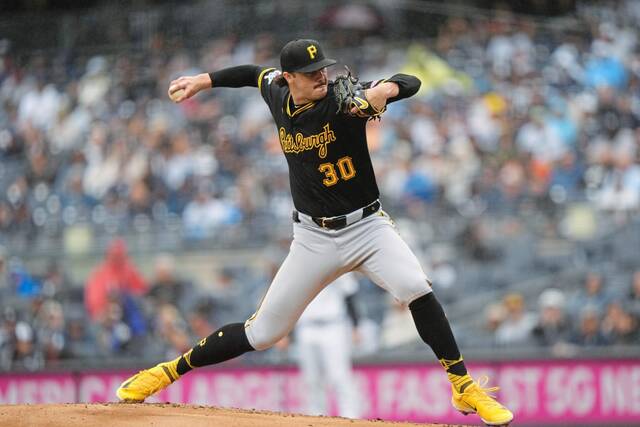 Pittsburgh Pirates’ Paul Skenes pitches during the first inning of a baseball game against the New York Yankees, Saturday, Sept. 28, 2024, in New York.