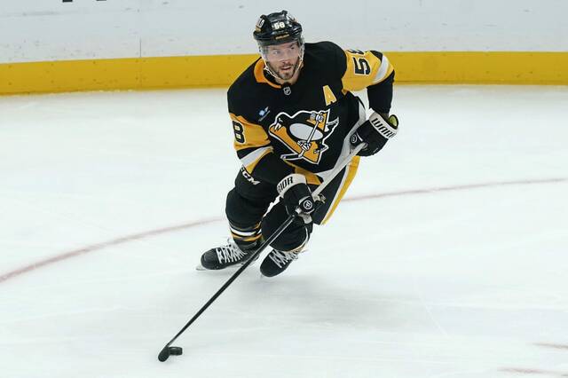 Pittsburgh Penguins’ Kris Letang (58) skates during the first period of an NHL hockey game against the Montreal Canadiens, Saturday, Nov. 2, 2024, in Pittsburgh.