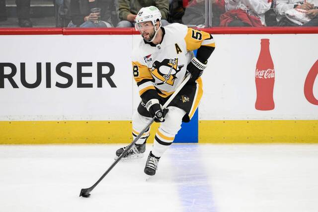 Pittsburgh Penguins defenseman Kris Letang (58) in action during the third period of an NHL hockey game against the Washington Capitals, Friday, Nov. 8, 2024, in Washington. The Penguins won 4-2.