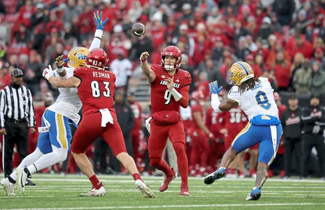 LOUISVILLE, KENTUCKY - NOVEMBER 23: Tyler Shough #9 of the Louisville Cardinals throws a pass against the Pittsburgh Panthers at Cardinal Stadium on November 23, 2024 in Louisville, Kentucky. (Photo by Andy Lyons/Getty Images)