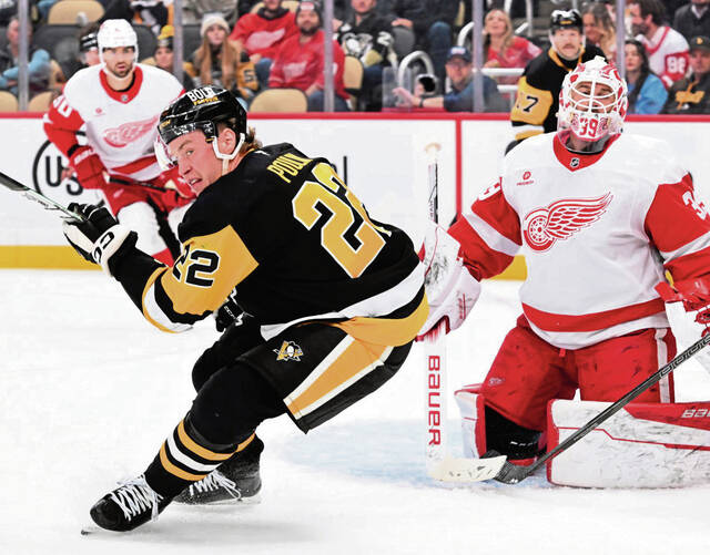 The Penguins’ Sam Poulin plays against the Red Wings’ in the third period Nov. 13, 2024 at PPG Paints Arena.