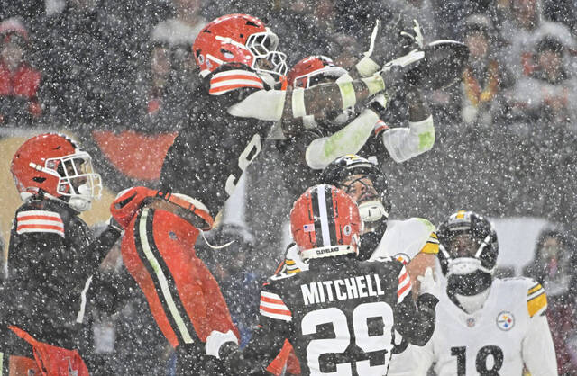 The Browns’ Grant Delpit knocks down a Russell Wilson pass in the end zone on the last play of the game Thursday at Huntington Bank Field in Cleveland.