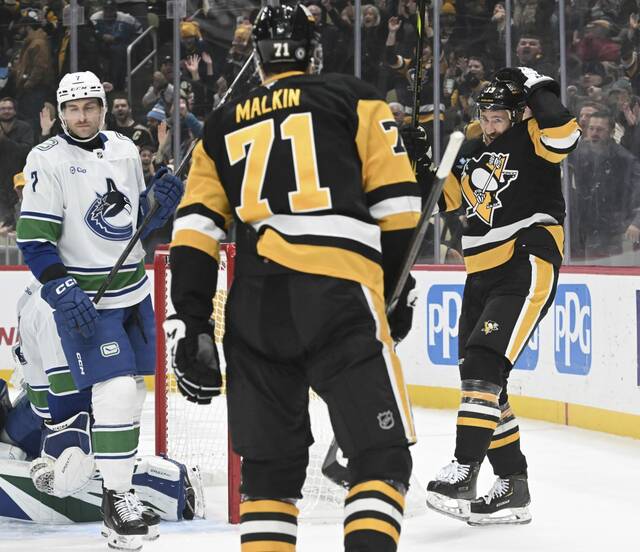 Penguins forward Kevin Hayes celebrates his a power-play goal during a 5-4 win against the Vancouver Canucks at PPG Paints Arena on Wednesday.