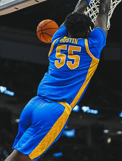 Pitt’s Zack Austin dunks against Ohio State on Nov. 29, 2024, at Ohio State.