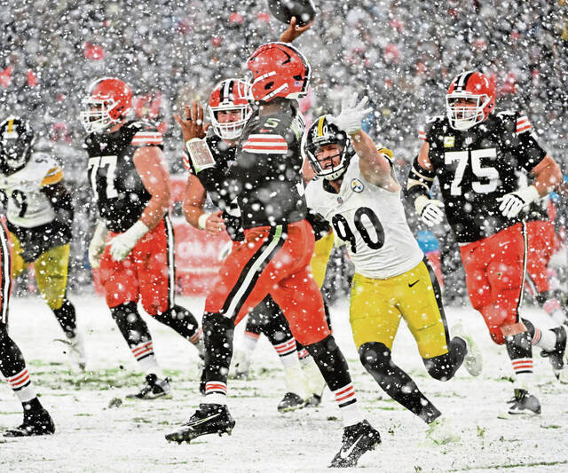 The Steelers’ T.J. Watt pressures Browns quarterback Jameis Winston in the third quarter Thursday Nov. 21, 2024 at Huntington Bank Field.