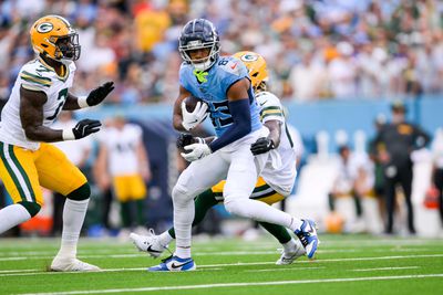 Tennessee Titans wide receiver Tyler Boyd trends upfield during the first half of a contest with the Green Bay Packers during the 2024 NFL regular season.