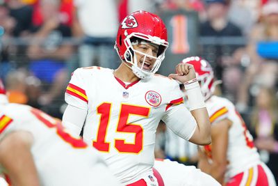 Kansas City Chiefs quarterback Patrick Mahomes talks to his team prior to a snap against the Las Vegas Raiders from Allegiant Stadium.