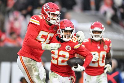 George Karlaftis #56 of the Kansas City Chiefs congratulates teammate Trent McDuffie #22 on an interception during the fourth quarter against the Cleveland Browns at Huntington Bank Field on December 15, 2024 in Cleveland, Ohio.