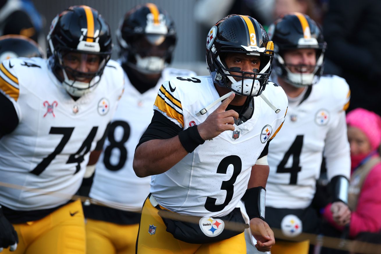 Russell Wilson #3 of the Pittsburgh Steelers takes the field ahead of Spencer Anderson #74 and Kyle Allen #4 before the game against the Baltimore Ravens at M&T Bank Stadium on December 21, 2024 in Baltimore, Maryland.