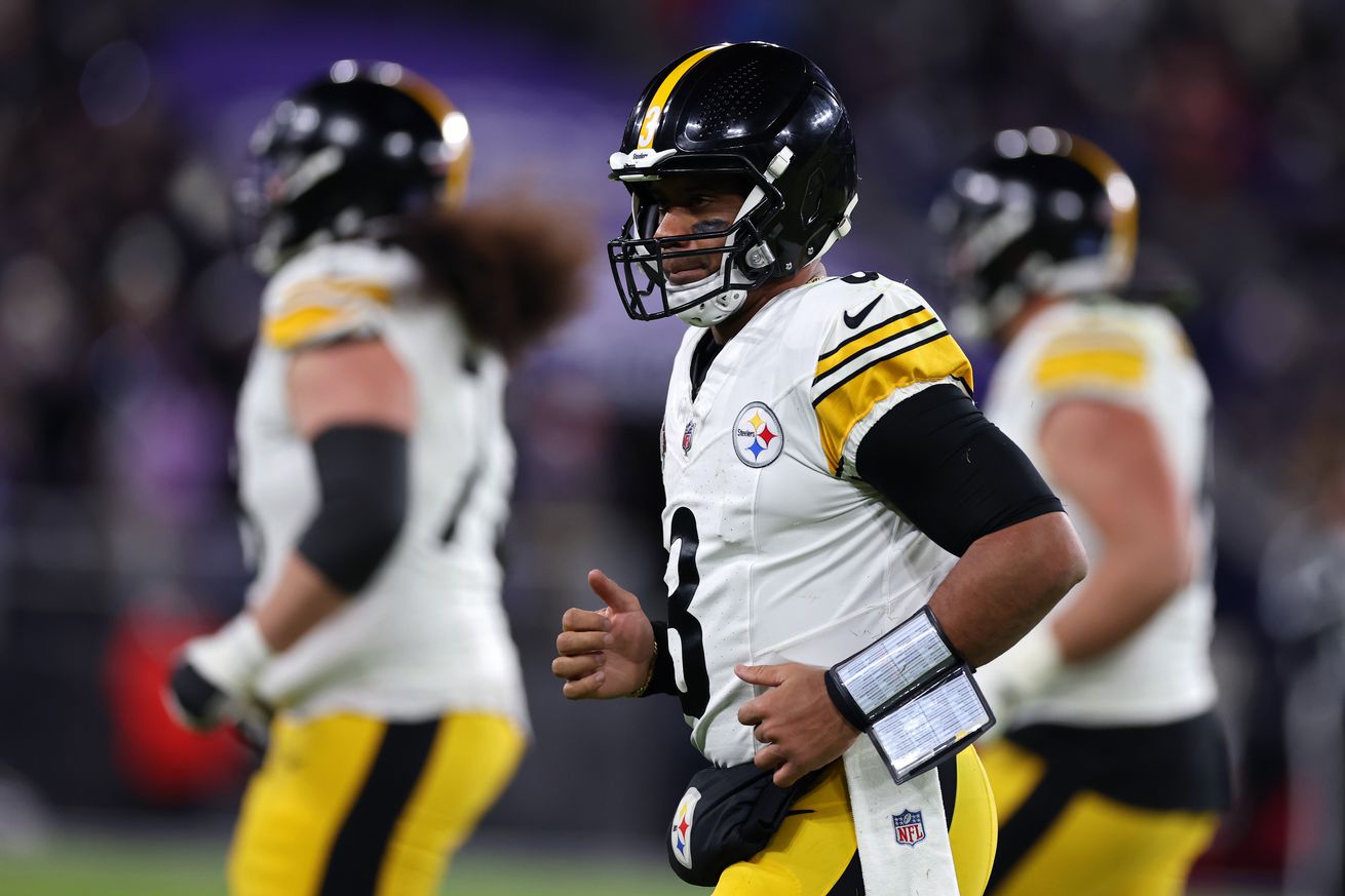 Russell Wilson #3 of the Pittsburgh Steelers runs off the field during the second quarter against the Baltimore Ravens at M&T Bank Stadium on December 21, 2024 in Baltimore, Maryland.