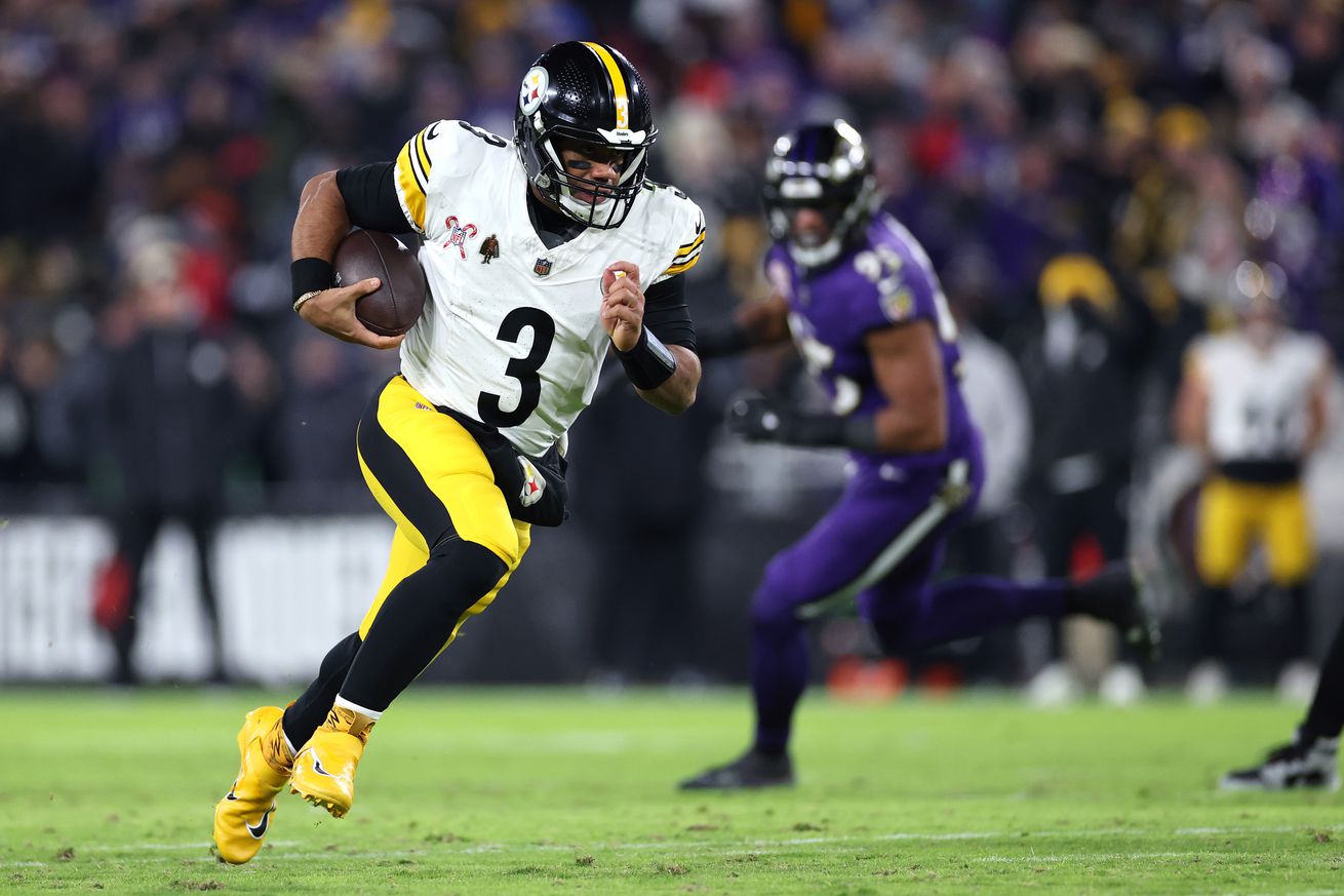 Russell Wilson #3 of the Pittsburgh Steelers runs the ball during the second quarter against the Baltimore Ravens at M&T Bank Stadium on December 21, 2024 in Baltimore, Maryland.