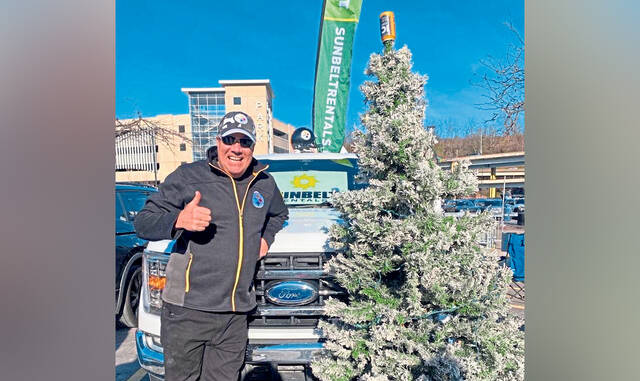 Jeff Hrapla of Cranberry, who brought a tree to a tailgate on Dec. 8 to Pittsburgh’s North Shore, said he will be tailgating before the Steelers game on Christmas Day.