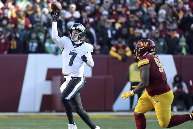 Eagles quarterback Kenny Pickett throws Sunday against the Washington Commanders in Landover, Md.