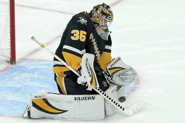 In 15 games this season, Penguins goaltender Jarry has a 7-5-2 record.