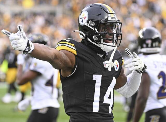 The Steelers’ George Pickens celebrates his first-down catch against the Ravens in the third quarter Sunday, Nov. 17, 2024, at Acrisure Stadium.