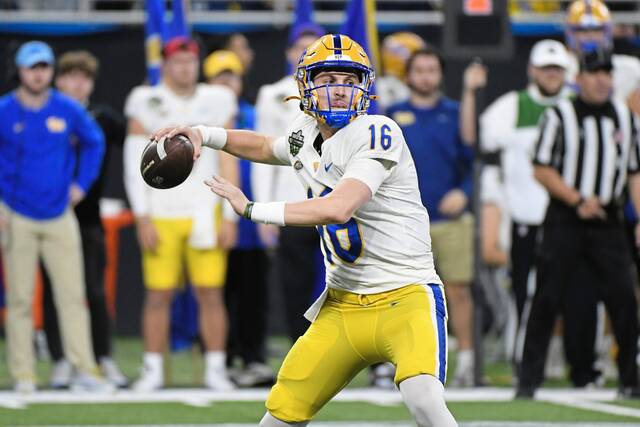 Pitt quarterback David Lynch throws against Toledo during the first half of the GameAbove Sports Bowl on Thursday.