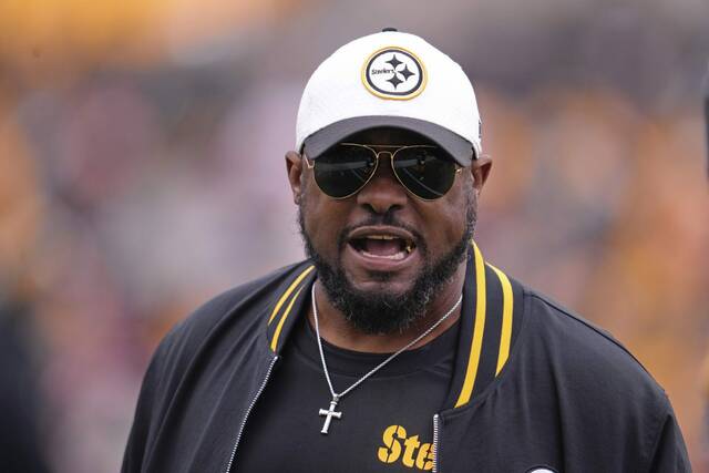 Pittsburgh Steelers head coach Mike Tomlin walks on the field as teams warm up before an NFL football game between the Pittsburgh Steelers and the Kansas City Chiefs, Wednesday, Dec. 25, 2024, in Pittsburgh.