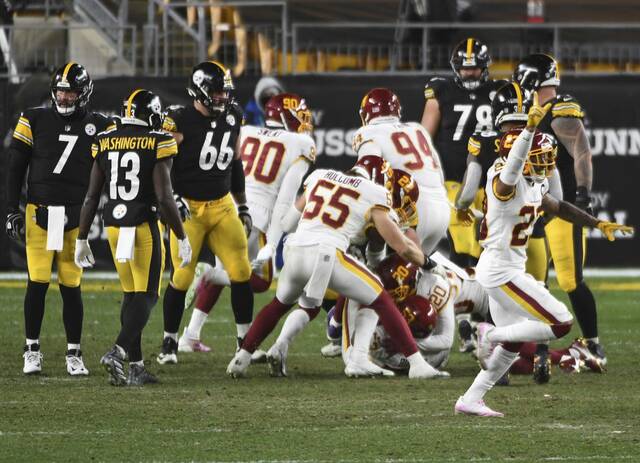 What was then called the Washington Football Team celebrates after Pittsburgh Steelers quarterback Ben Roethlisberger had his final pass deflected and then intercepted the fourth quarter to seal a Washington victory on Dec. 7, 2020, at what was then called Heinz Field. The victory dropped the Steelers to 11-1 and precipitated a collapse that had them lose five of their final six (including playoffs) of the season. It was just one recent example of a late-season Steelers swoon.