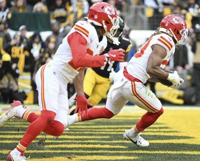 Kansas City Chiefs safety Justin Reid pulls in a interception in the end zone during last week’s win against the Pittsburgh Steelers at Acrisure Stadium. Steelers coach Mike Tomlin on Monday absolved receiver George Pickens’ route-running for blame on the play.